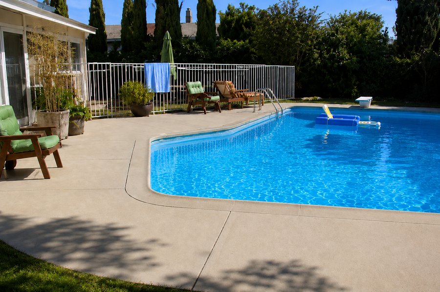 Bright blue backyard pool
